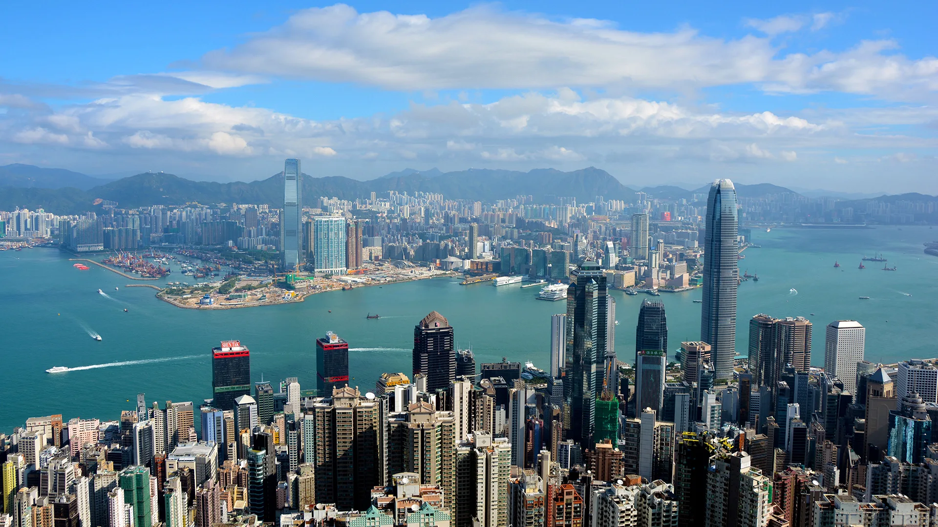 Both Kong Kong Island and Kowloon as seen from Victoria Peak and Lugard Road on the Hong Kong Island side of the city.